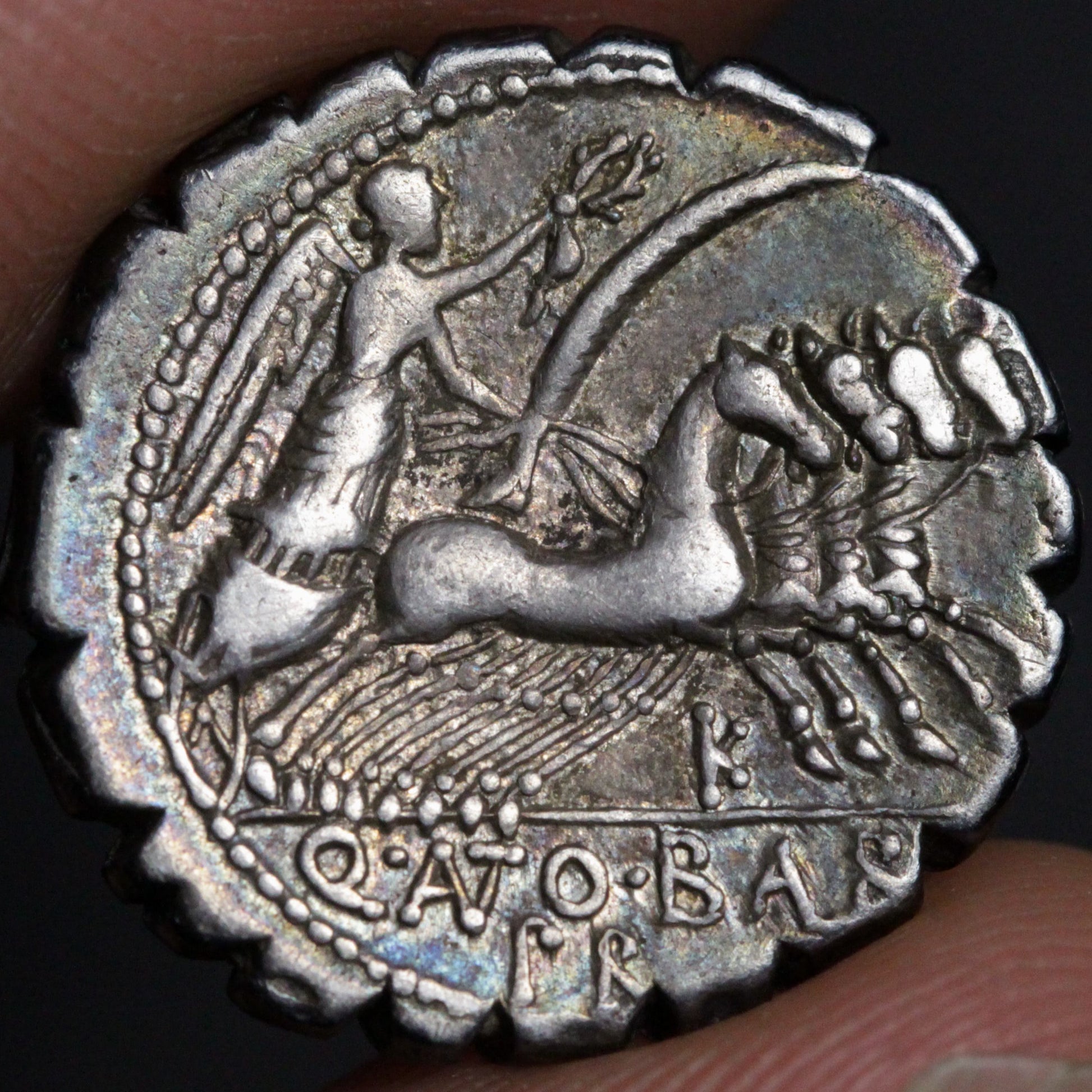 balbus denarius reverse side showing victory driving a four-horse chariot