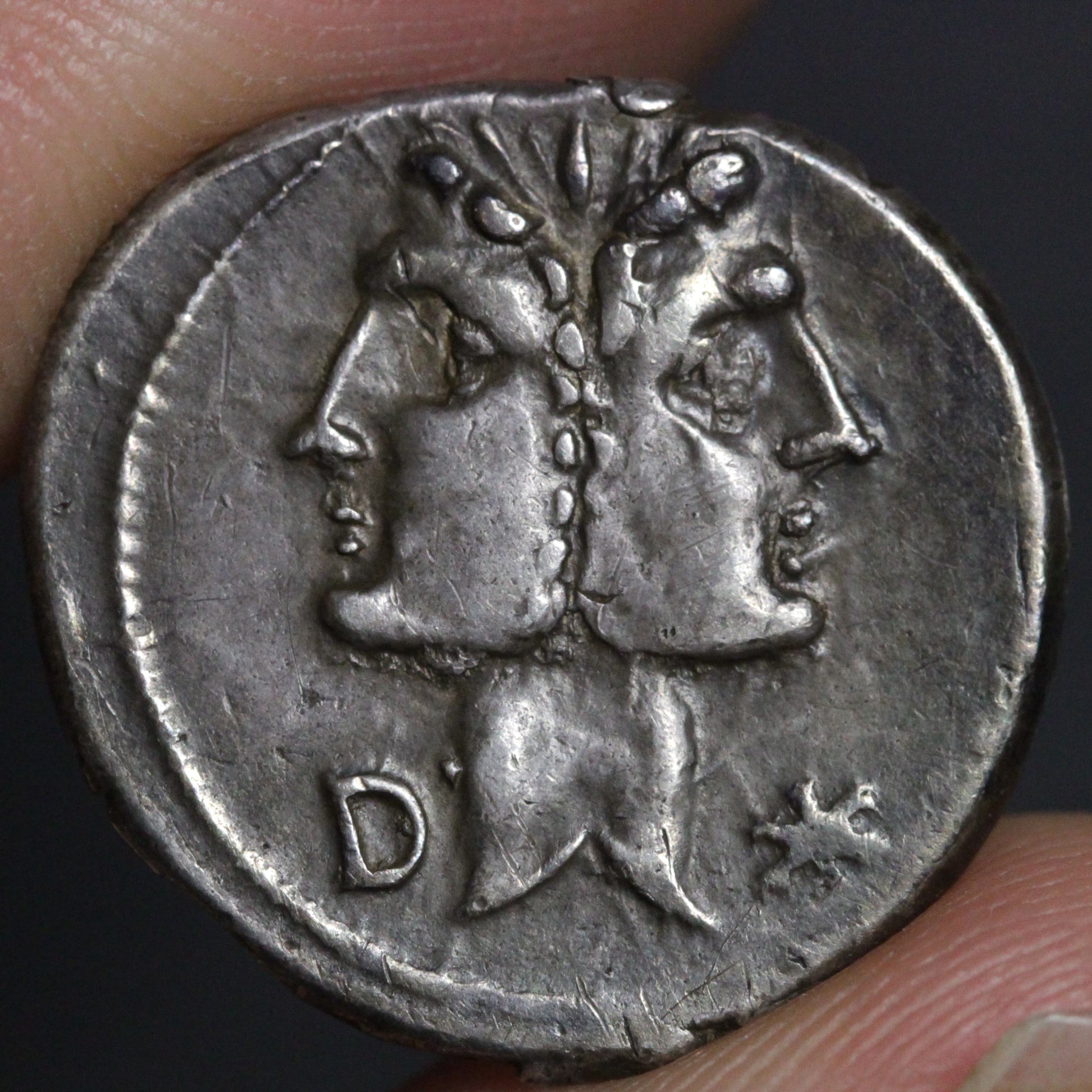 fonteius denarius obverse showing janiform heads of dioscuri