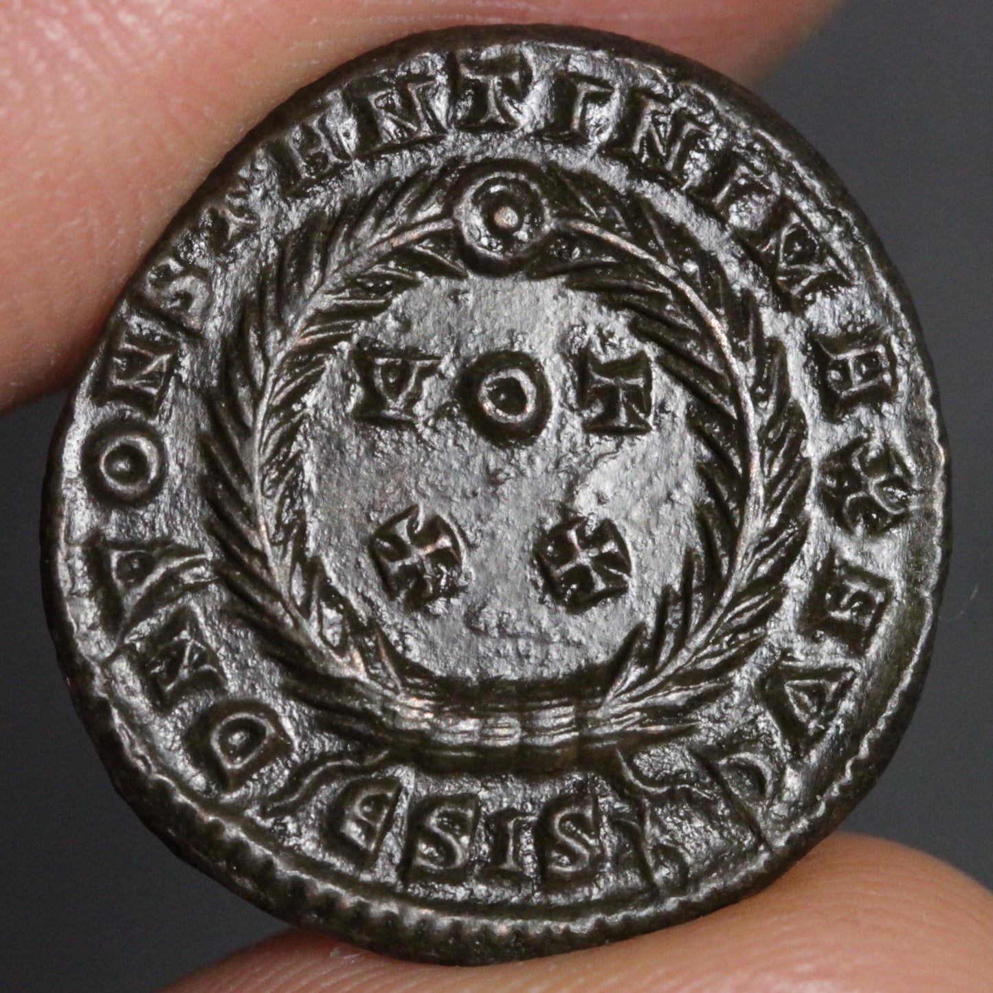 reverse side of constantine follis showing VOT XX design
