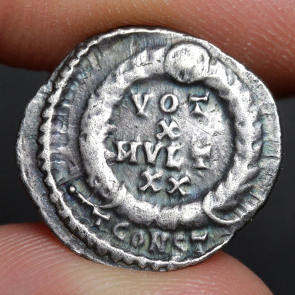 julian the apostate siliqua reverse side held between two fingers