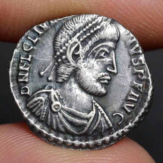 julian the apostate siliqua obverse side held between two fingers