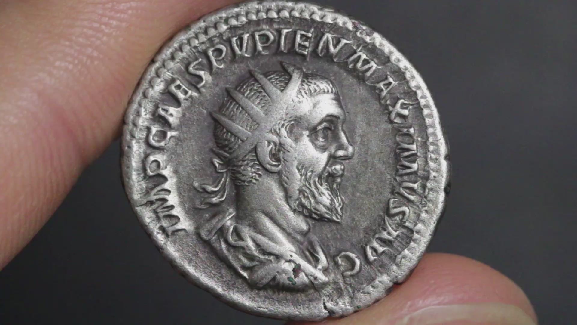 video of pupienus antoninianus coin being rotated to show both sides
