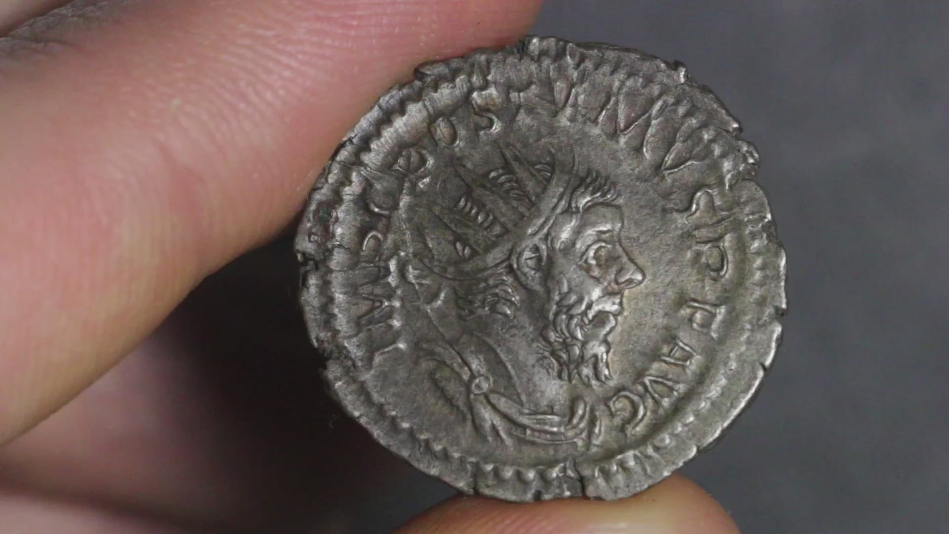 video of postumus antoninianus being rotated to show both sides of coin