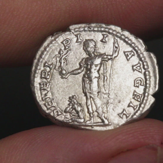 video of caracalla denarius being rotated between fingers to show both sides