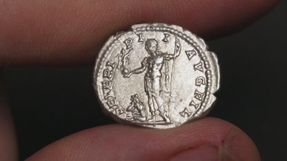 video of caracalla denarius being rotated between fingers to show both sides