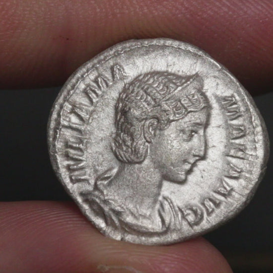 video showing julia mamaea denarius being rotated between two fingers