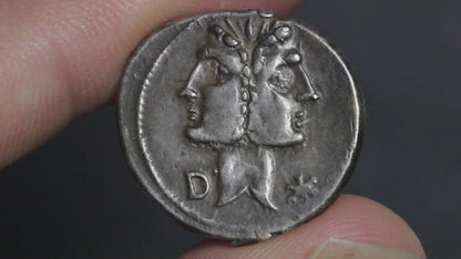 video showing denarius being rotated between two fingers to show both sides