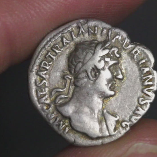 video of hadrian denarius with coin rotated to show both sides