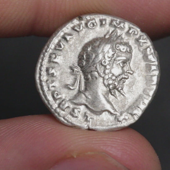 video of septimius severus denarius being rotated betwen two fingers to show both sides