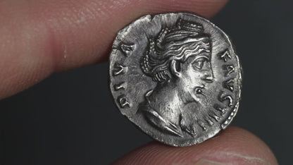 video showing faustina the elder denarius rotated between fingers to display both sides