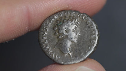 video showing the denarius coin being rotated to display both sides