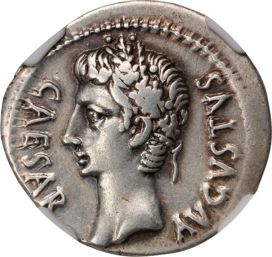 Silver coin with profile of a Roman emperor and engraved text